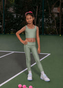 The Amalfi Pearl Sterling Leggings in a luminous, soft ivory-grey with quiet, elevated shimmer.