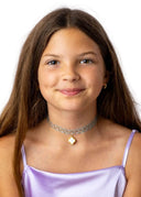 The Turquoise Chloe Choker with 18K Gold Plated Charm in a bright, clear blue-green inspired by tropical water.