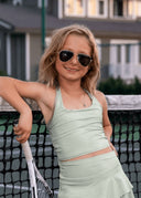 The Amalfi Pearl Gemma Top in a luminous, soft ivory-grey with quiet, elevated shimmer.