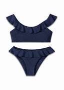 The Côte Navy Josie Bikini Top featuring convertible neckline — wear off-the-shoulder or on.