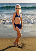 The Côte Navy Scottie Bikini Top featuring timeless triangle silhouette.