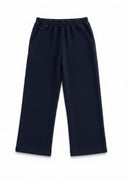 The Deep Tide Grayson Pant in a rich, inky blue inspired by the ocean at dusk.