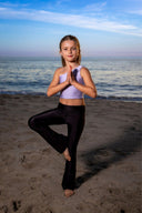The Noir Lucy Leggings in a sleek, all-black edge that slims and polishes effortlessly.