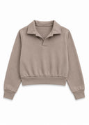 The Sandstone Andrew Collared Pullover in a warm, sun-bleached neutral inspired by beach dunes.