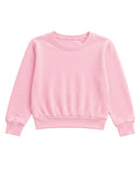 The Shell Pink Maya Sweatshirt. The relaxed, easy fit makes it perfect for everything from beach mornings and cool evenings to everyday play and travel.
