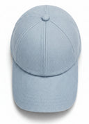 The Skywash Denim Silk Lined Brooklyn Cap in a soft, faded denim blue inspired by wide open skies.